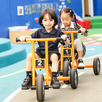 Nursery pupils in a playground at Brighton College Abu Dhabi 422 x 422